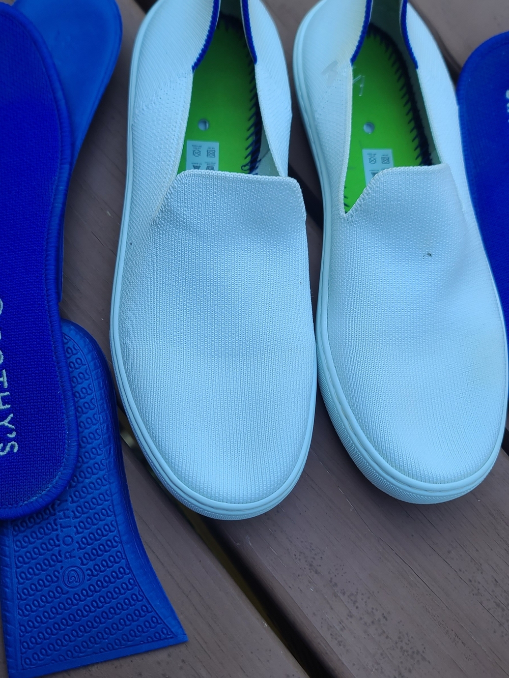 Rothy's White Slip-On Sneakers with Green Insole